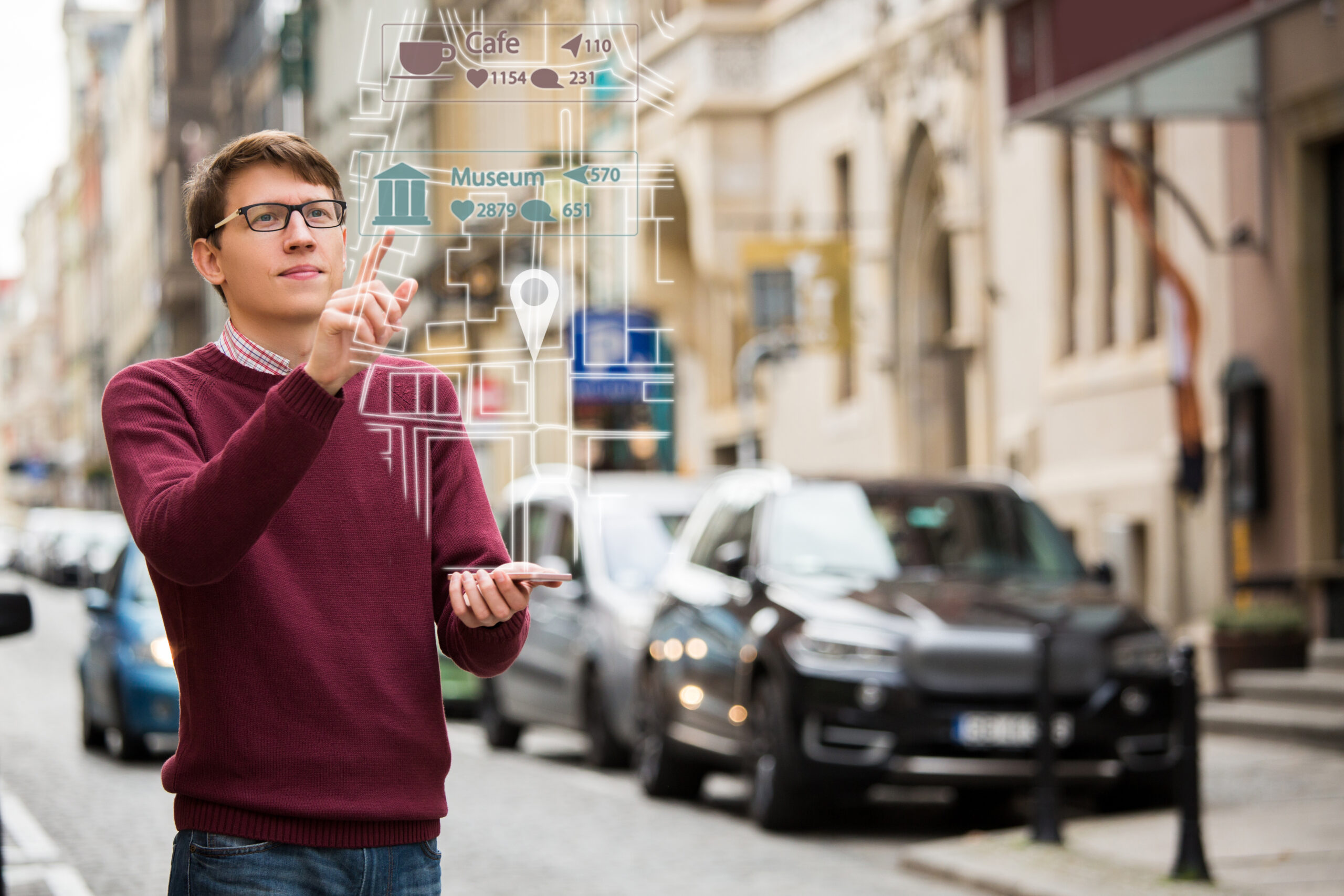 Man navigated a simulated augmented reality map while standing in an urban street