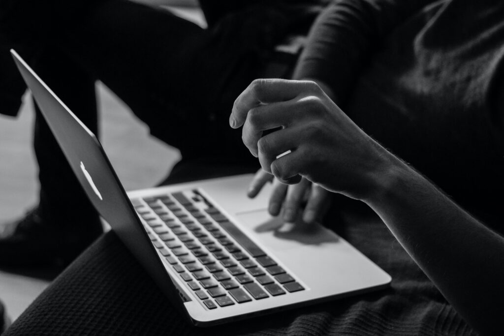 A person using a laptop.